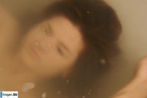The girl in the bathroom plays with wax. Thumbnail 24