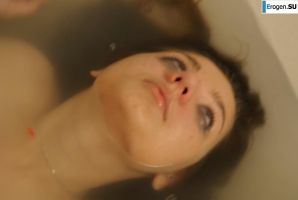 The girl in the bathroom plays with wax. Thumbnail 38