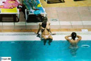 Girls sunbathe topless near the pool. Thumbnail 11