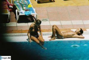 Girls sunbathe topless near the pool. Thumbnail 19