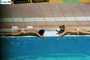 Girls sunbathe topless near the pool. Thumbnail 27