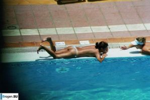Girls sunbathe topless near the pool. Thumbnail 29