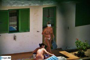 Girls sunbathe topless near the pool. Thumbnail 33