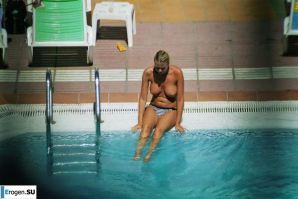Girls sunbathe topless near the pool. Part 2. Thumbnail 13
