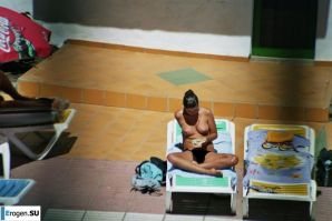 Girls sunbathe topless near the pool. Part 2. Thumbnail 14