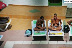 Girls sunbathe topless near the pool. Part 2. Thumbnail 17