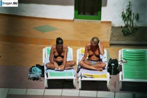 Girls sunbathe topless near the pool. Part 2. Thumbnail 18