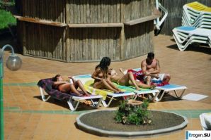 Girls sunbathe topless near the pool. Part 2. Thumbnail 21
