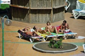 Girls sunbathe topless near the pool. Part 2. Thumbnail 23