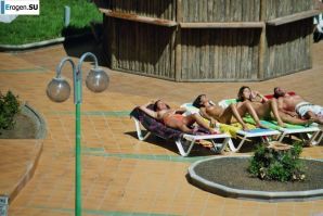 Girls sunbathe topless near the pool. Part 2. Thumbnail 26