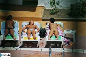 Girls sunbathe topless near the pool. Part 2. Thumbnail 28