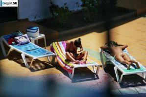 Girls sunbathe topless near the pool. Part 2. Thumbnail 30