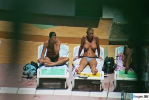 Girls sunbathe topless near the pool. Part 2. Thumbnail 34