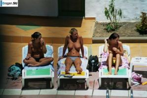 Girls sunbathe topless near the pool. Part 2. Thumbnail 36