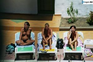 Girls sunbathe topless near the pool. Part 2. Thumbnail 37
