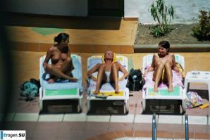 Girls sunbathe topless near the pool. Part 2. Thumbnail 40
