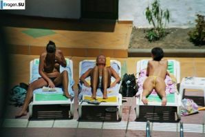Girls sunbathe topless near the pool. Part 3. Thumbnail 14