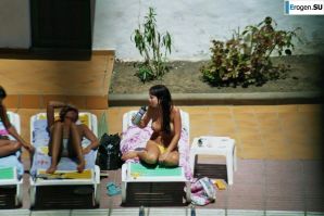 Girls sunbathe topless near the pool. Part 3. Thumbnail 22