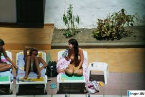 Girls sunbathe topless near the pool. Part 3. Thumbnail 24