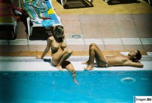 Girls sunbathe topless near the pool. Part 3. Thumbnail 26