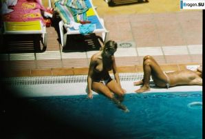 Girls sunbathe topless near the pool. Part 3. Thumbnail 29