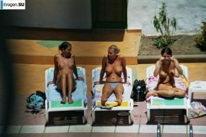 Girls sunbathe topless near the pool. Part 3. Thumbnail 6