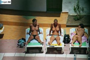 Girls sunbathe topless near the pool. Part 3. Thumbnail 7