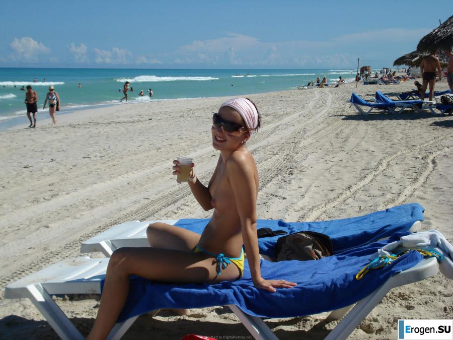 resting naked on the beach. Slide 1