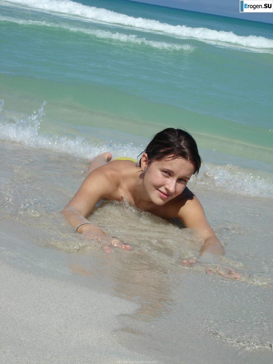 resting naked on the beach. Slide 12