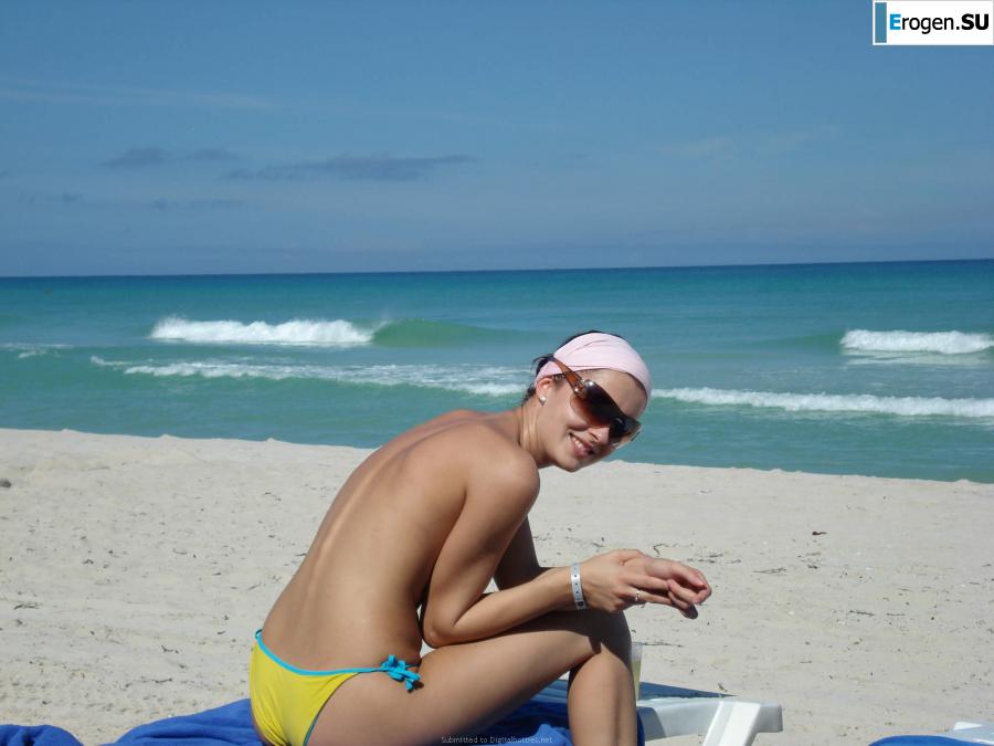 resting naked on the beach. Slide 2