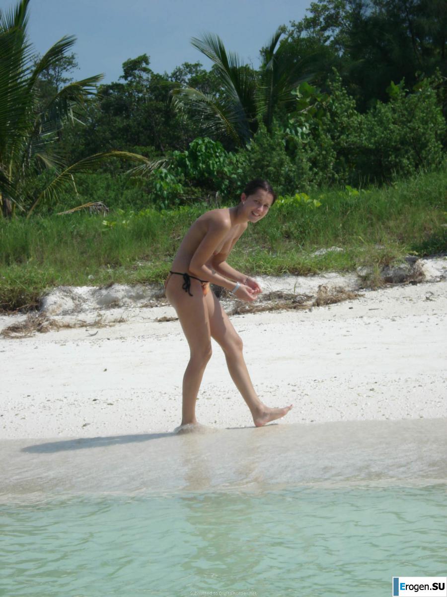 resting naked on the beach. Slide 39