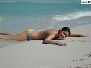 resting naked on the beach. Thumbnail 13