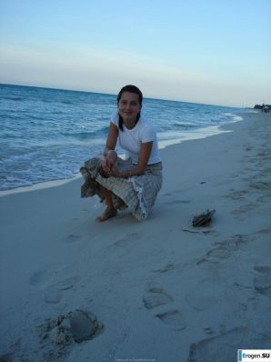 resting naked on the beach. Thumbnail 22