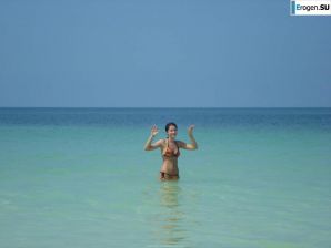 resting naked on the beach. Thumbnail 30