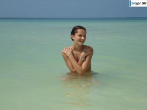 resting naked on the beach. Thumbnail 31