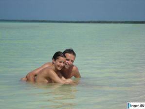 resting naked on the beach. Thumbnail 34