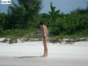 resting naked on the beach. Thumbnail 38