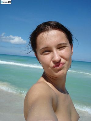 resting naked on the beach. Thumbnail 5