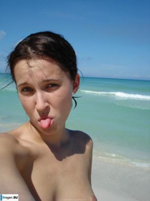 resting naked on the beach. Thumbnail 6
