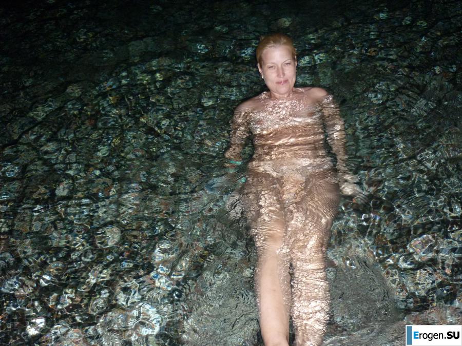 naked on the rocky shores. Slide 1