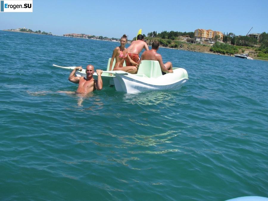 tanned girlfriends on a rocky shore. Slide 10