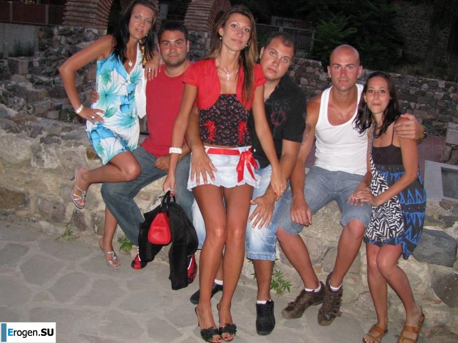 tanned girlfriends on a rocky shore. Slide 22