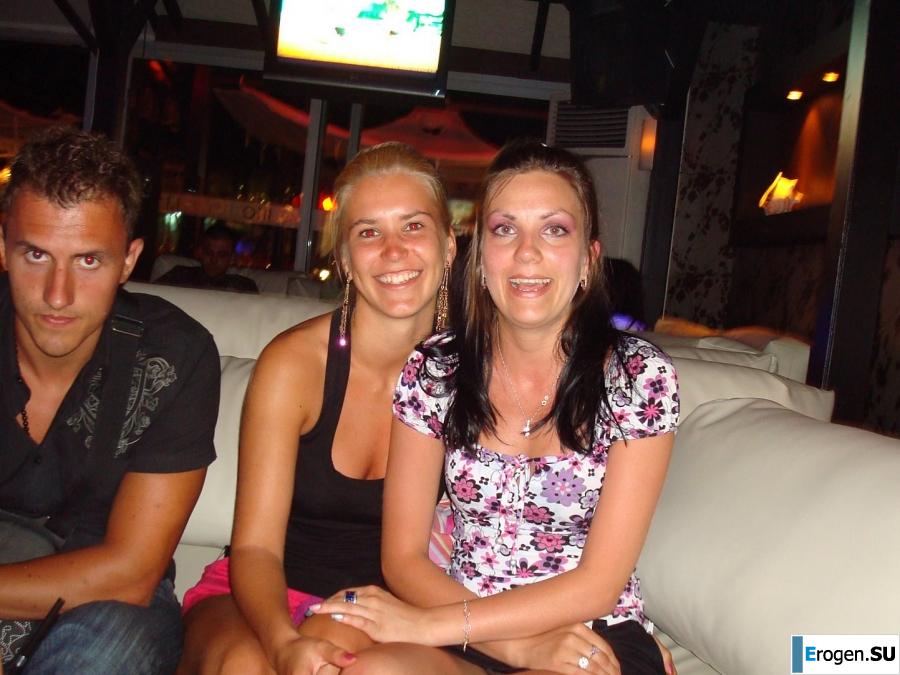 tanned girlfriends on a rocky shore. Slide 33
