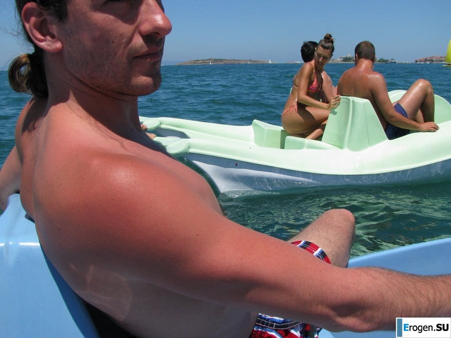 tanned girlfriends on a rocky shore. Slide 9