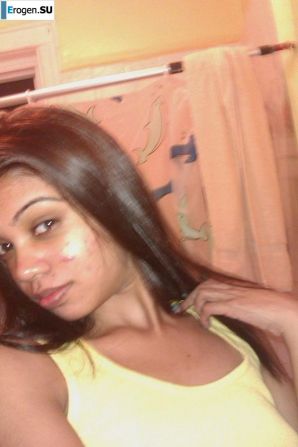 slim dark-skinned girl undresses. Thumbnail 6