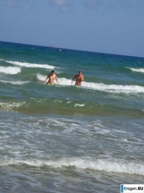 fun on a nudist beach. Thumbnail 10