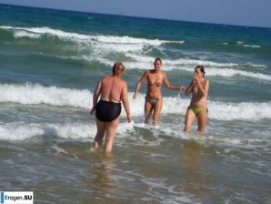 fun on a nudist beach. Thumbnail 12