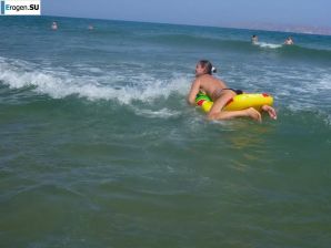 fun on a nudist beach. Thumbnail 19