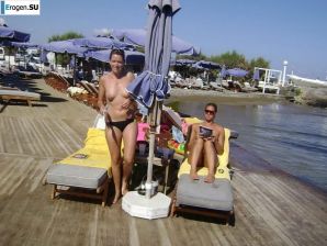 fun on a nudist beach. Thumbnail 2