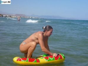 fun on a nudist beach. Thumbnail 21